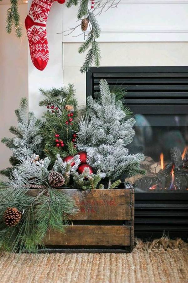 Decorar chimenea con cajas de madera